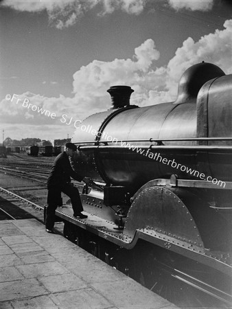 ENGINE DRIVER AT WORK ON LOCOS